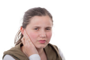 young girl has earaches