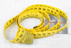 Measuring tape on scales
