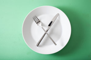 concept of intermittent fasting and ketogenic diet, weight loss.